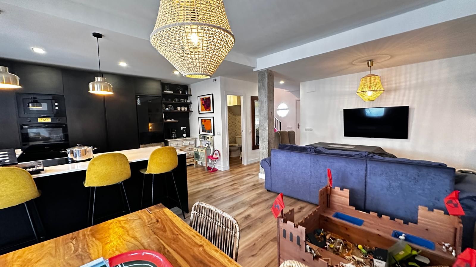 Sala de estar de Casa adosada en venta en Gines con Aire acondicionado y Terraza