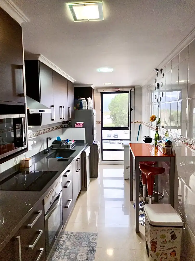 Kitchen of Flat for sale in Sueca  with Air Conditioner, Storage room and Balcony