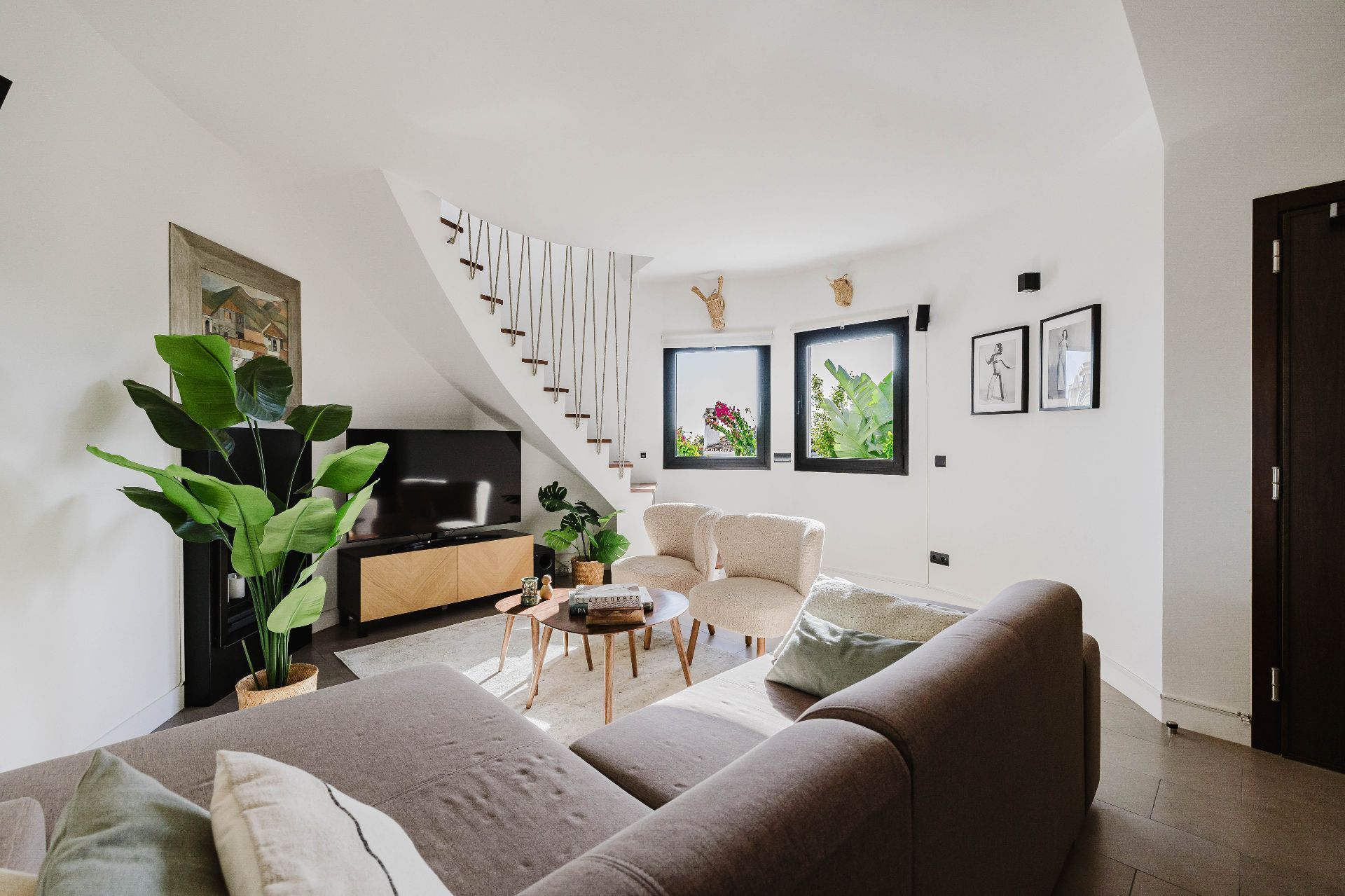 Sala d'estar de Casa adosada en venda en Benalmádena amb Aire condicionat, Jardí privat i Terrassa