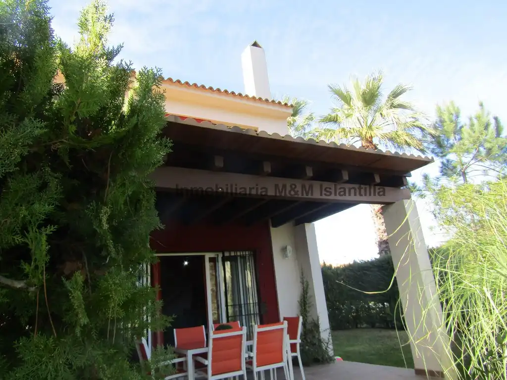 Vista exterior de Casa adosada en venta en Islantilla con Jardín privado, Terraza y Amueblado