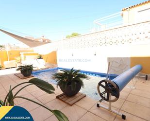 Swimming pool of House or chalet for sale in Orihuela  with Air Conditioner, Heating and Private garden