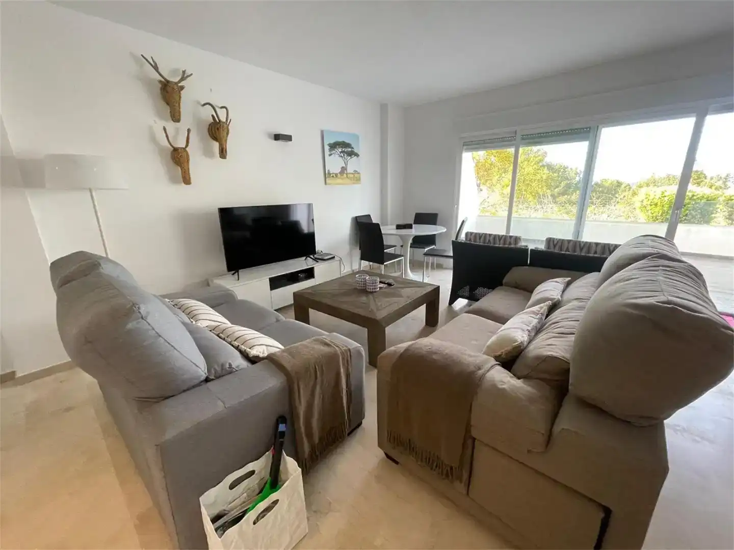 Sala de estar de Dúplex en venta en Santa Eulària des Riu con Aire acondicionado, Piscina y Amueblado