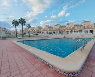 Swimming pool of Duplex for sale in Torrevieja  with Air Conditioner, Private garden and Terrace