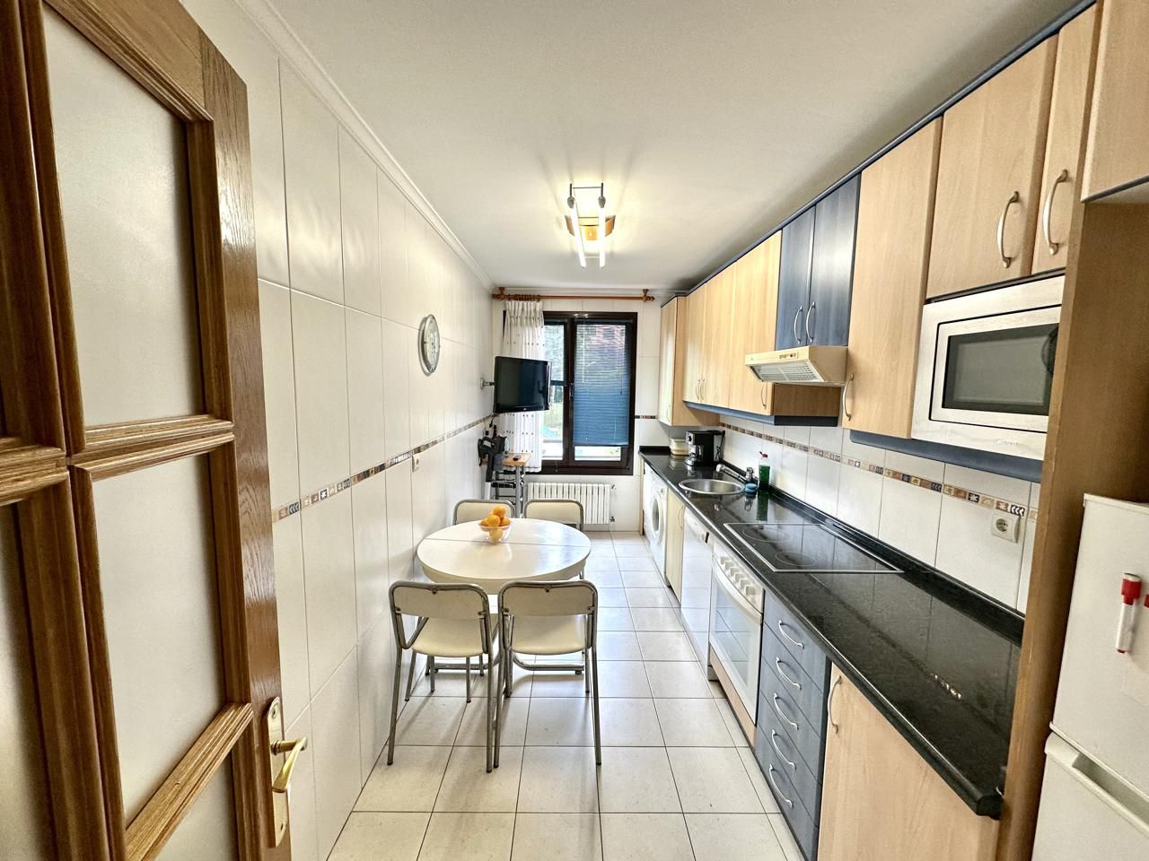 Kitchen of Flat for sale in Gijón   with Heating, Private garden and Storage room