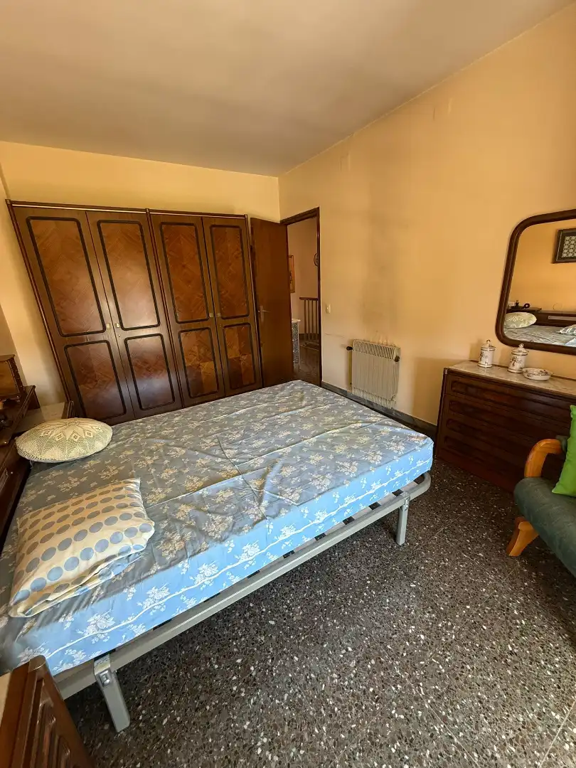 Schlafzimmer von Einfamilien-Reihenhaus zum Verkauf in Sant Celoni mit Klimaanlage, Heizung und Balkon