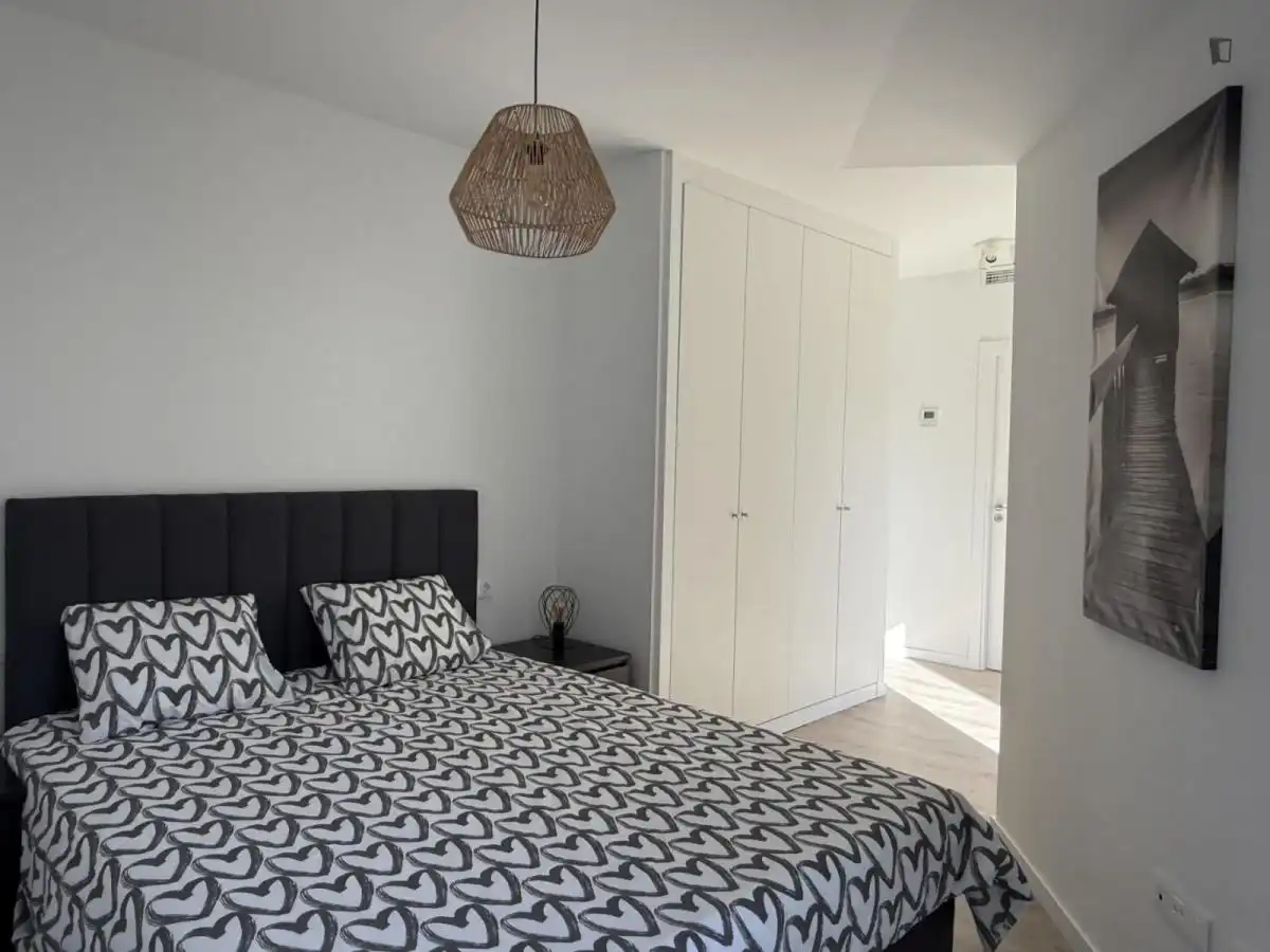 Dormitori de Apartament de lloguer en Málaga amb Aire condicionat, Calefacció i Moblat