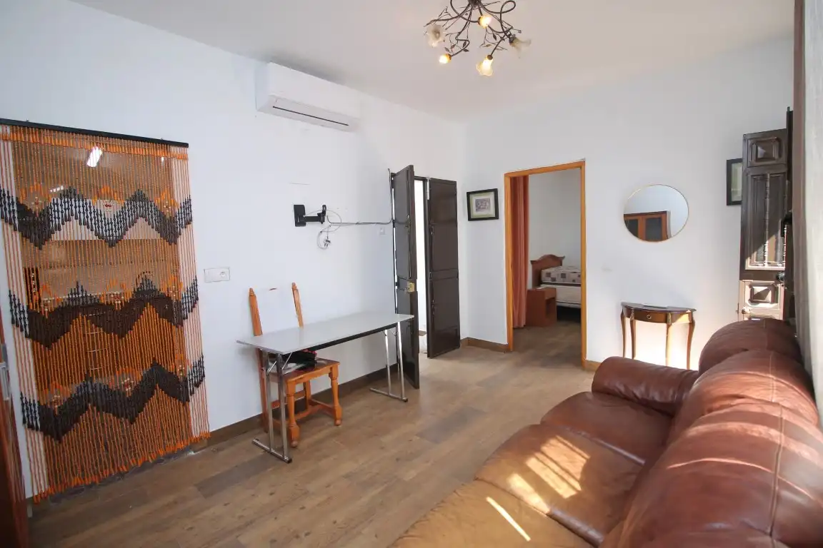Sala d'estar de Casa adosada en venda en Vélez-Málaga amb Aire condicionat, Calefacció i Terrassa