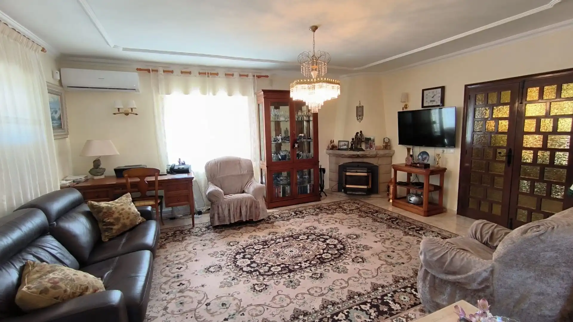 Sala d'estar de Casa o xalet en venda en L'Alfàs del Pi amb Aire condicionat, Calefacció i Jardí privat