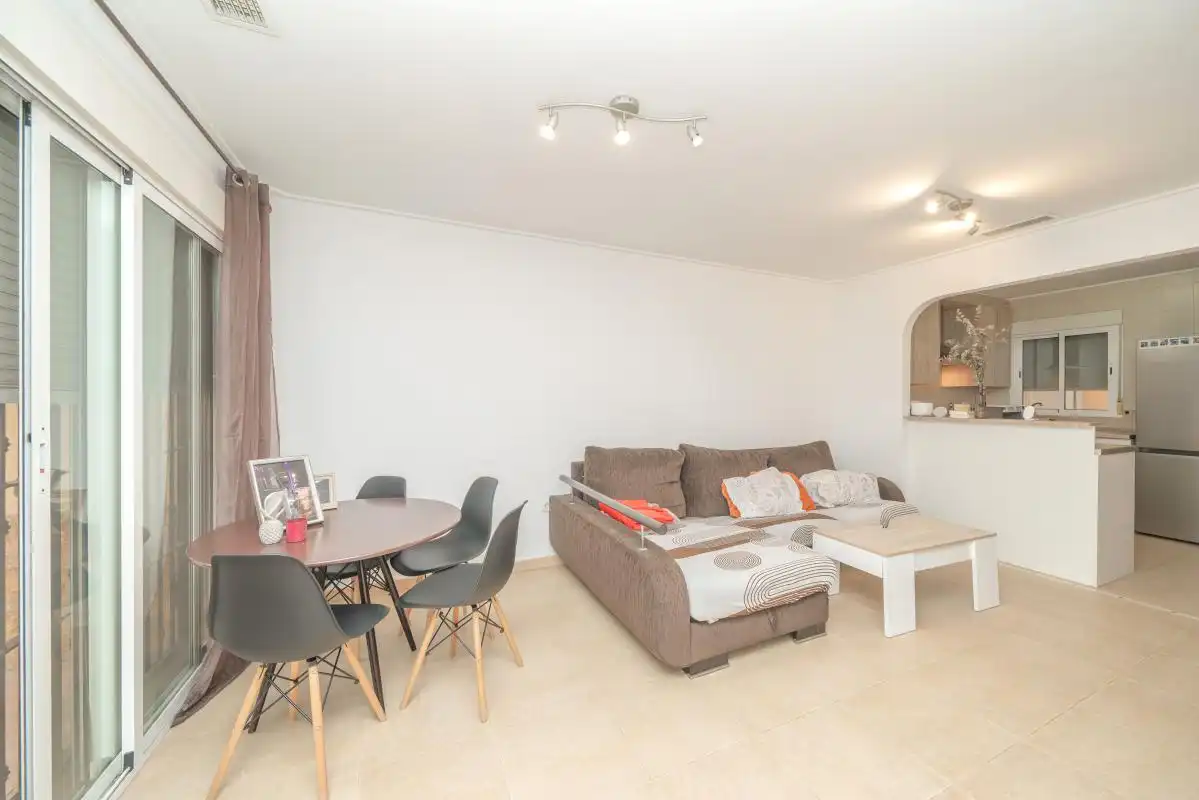 Sala de estar de Casa adosada en venta en Almoradí con Aire acondicionado, Calefacción y Terraza