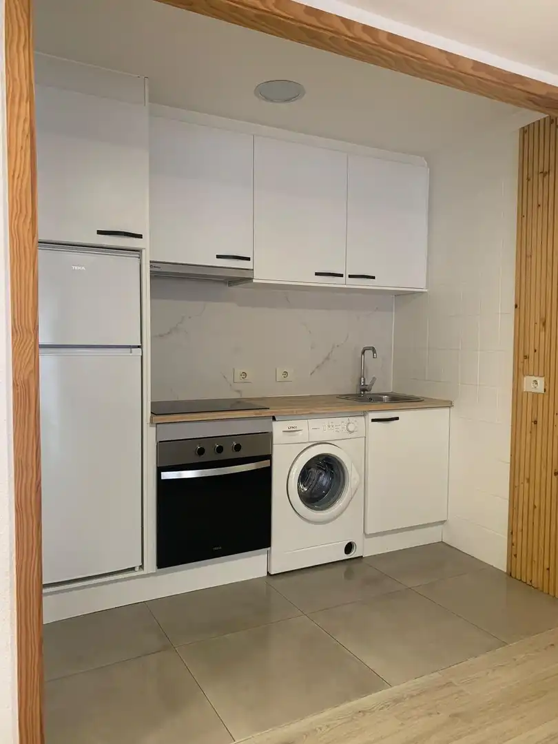 Kitchen of Apartments for rent in Ourense Capital   with Heating, Parquet flooring and Storage room