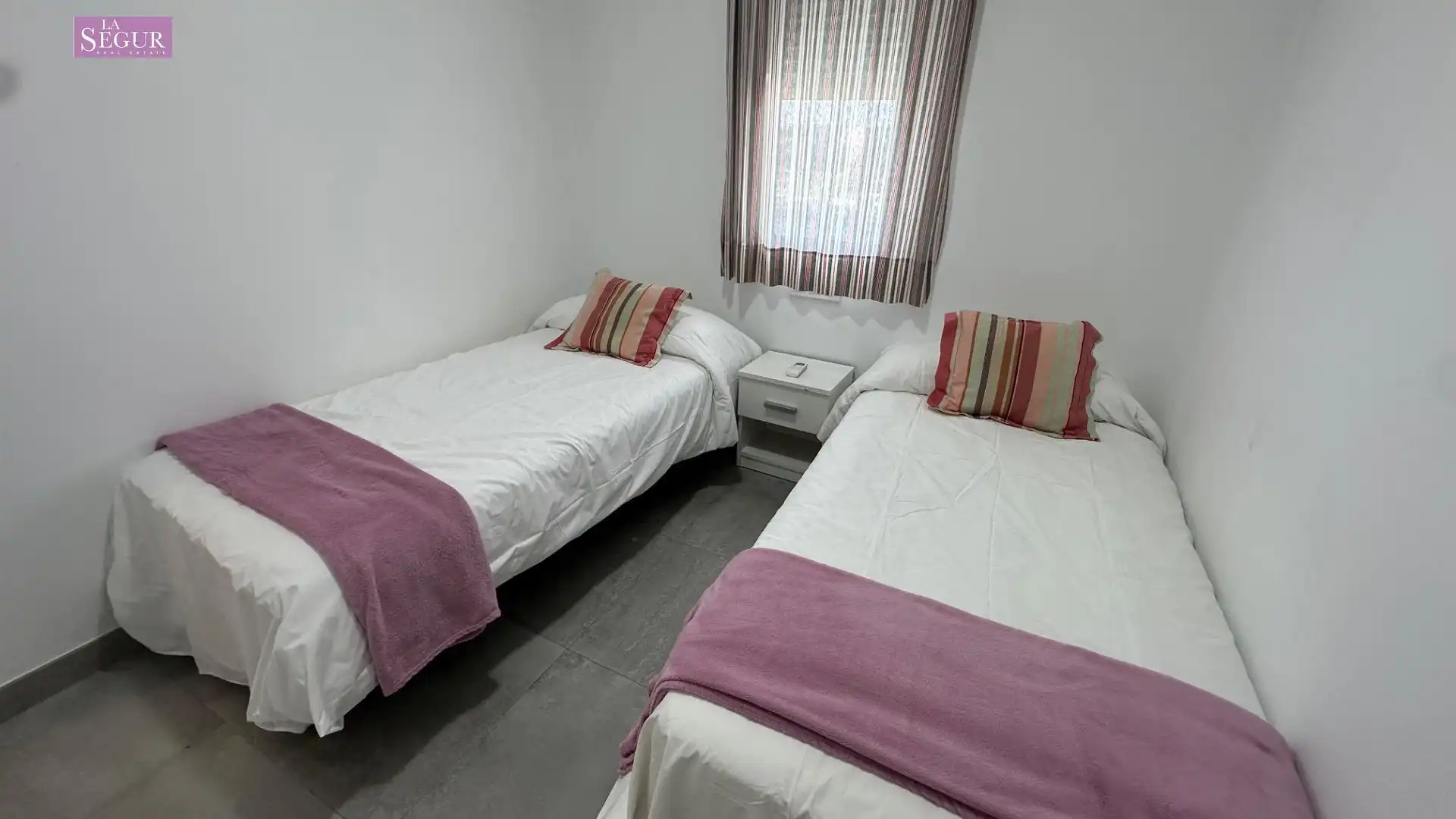 Dormitori de Casa adosada de lloguer en Conil de la Frontera amb Aire condicionat, Terrassa i Moblat