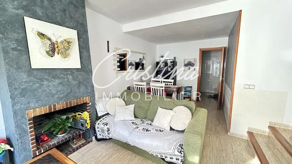 Sala d'estar de Casa adosada en venda en Santa Cristina d'Aro amb Calefacció i Jardí privat
