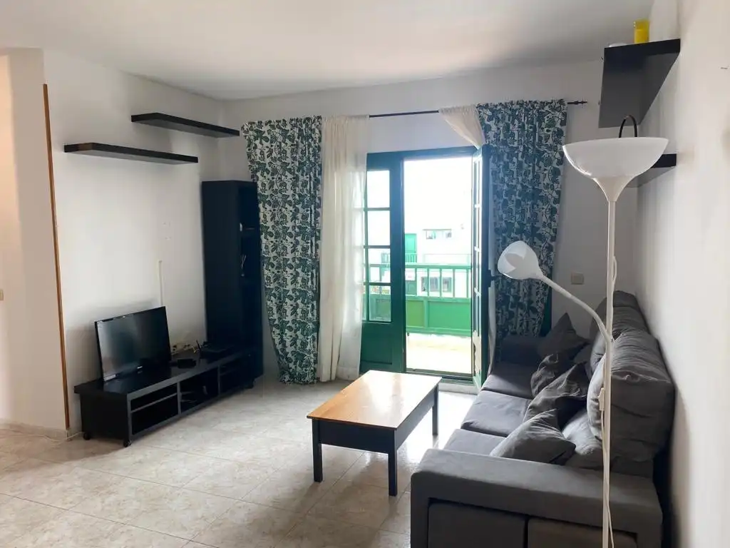 Sala de estar de Apartamento en venta en Teguise con Terraza, Amueblado y Piscina comunitaria