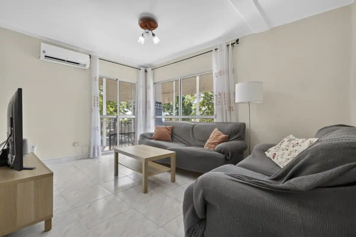 Wohnzimmer von Wohnung zum Verkauf in San Juan de Aznalfarache mit Klimaanlage, Heizung und Terrasse