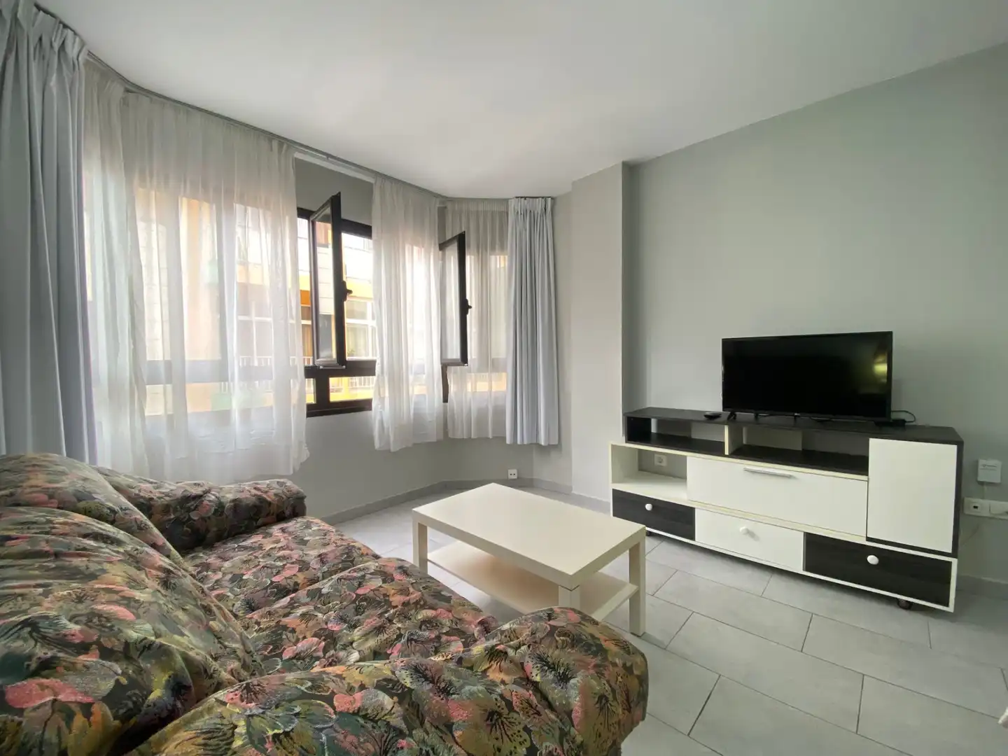 Sala d'estar de Pis de lloguer en Las Palmas de Gran Canaria amb Moblat