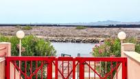 Vista exterior de Casa adosada en venda en La Manga del Mar Menor amb Terrassa i Balcó