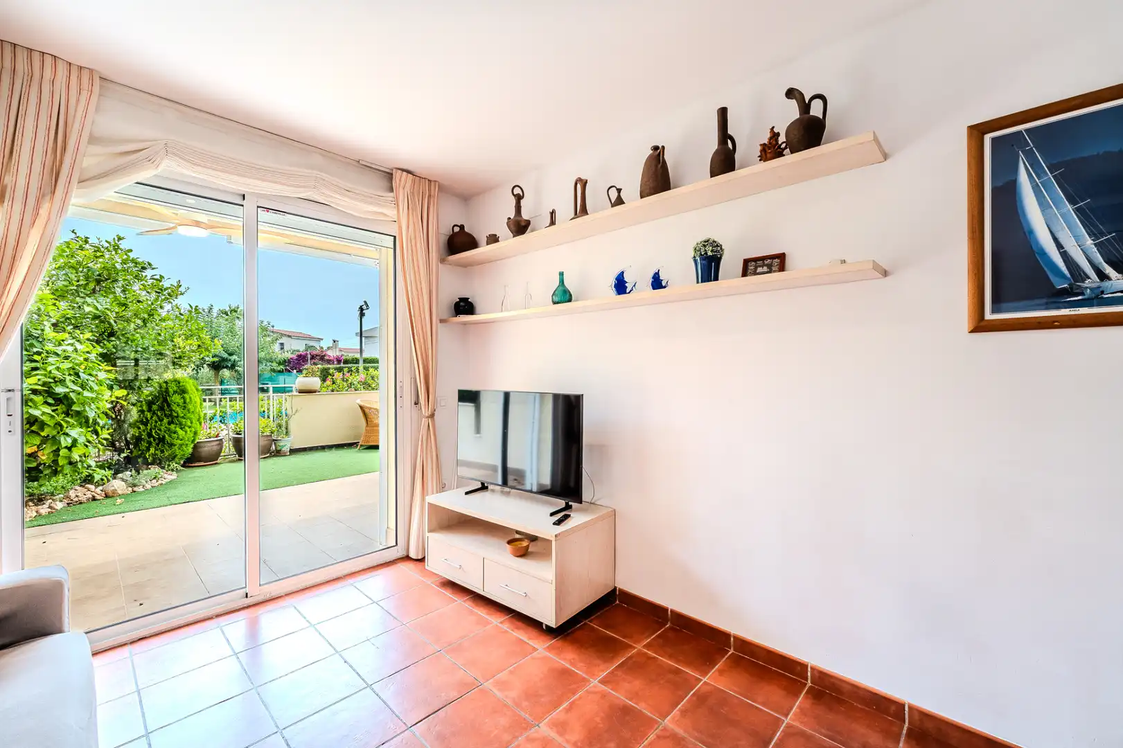 Sala de estar de Piso en venta en L'Ampolla con Aire acondicionado, Calefacción y Terraza