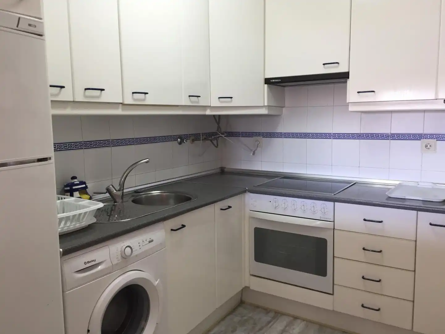Cocina de Piso de alquiler en El Portil con Jardín privado, Terraza y Piscina