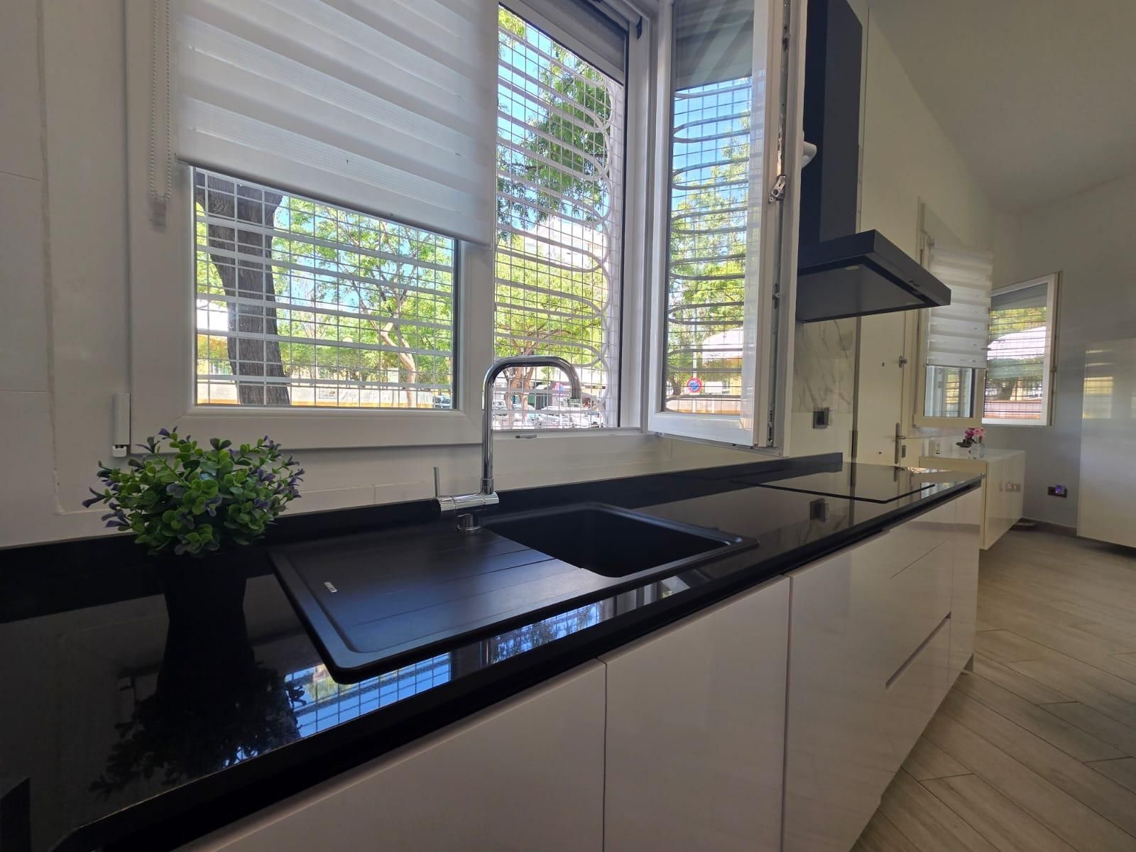 Kitchen of Flat for sale in Benalmádena  with Air Conditioner, Private garden and Community pool