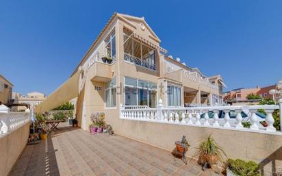 Exterior view of Single-family semi-detached for sale in Torrevieja  with Air Conditioner and Terrace