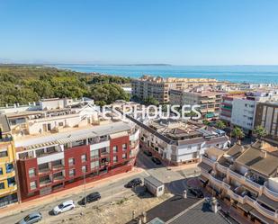 Exterior view of Attic for sale in Guardamar del Segura  with Air Conditioner, Terrace and Storage room