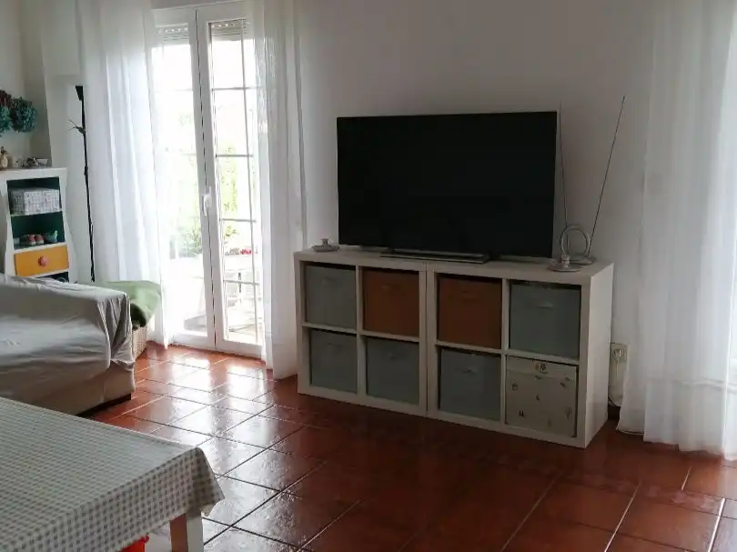 Sala d'estar de Casa adosada en venda en Marina de Cudeyo amb Calefacció, Jardí privat i Terrassa