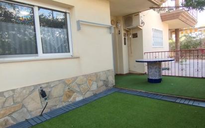 Garden of Planta baja for sale in Alcanar  with Air Conditioner, Terrace and Furnished