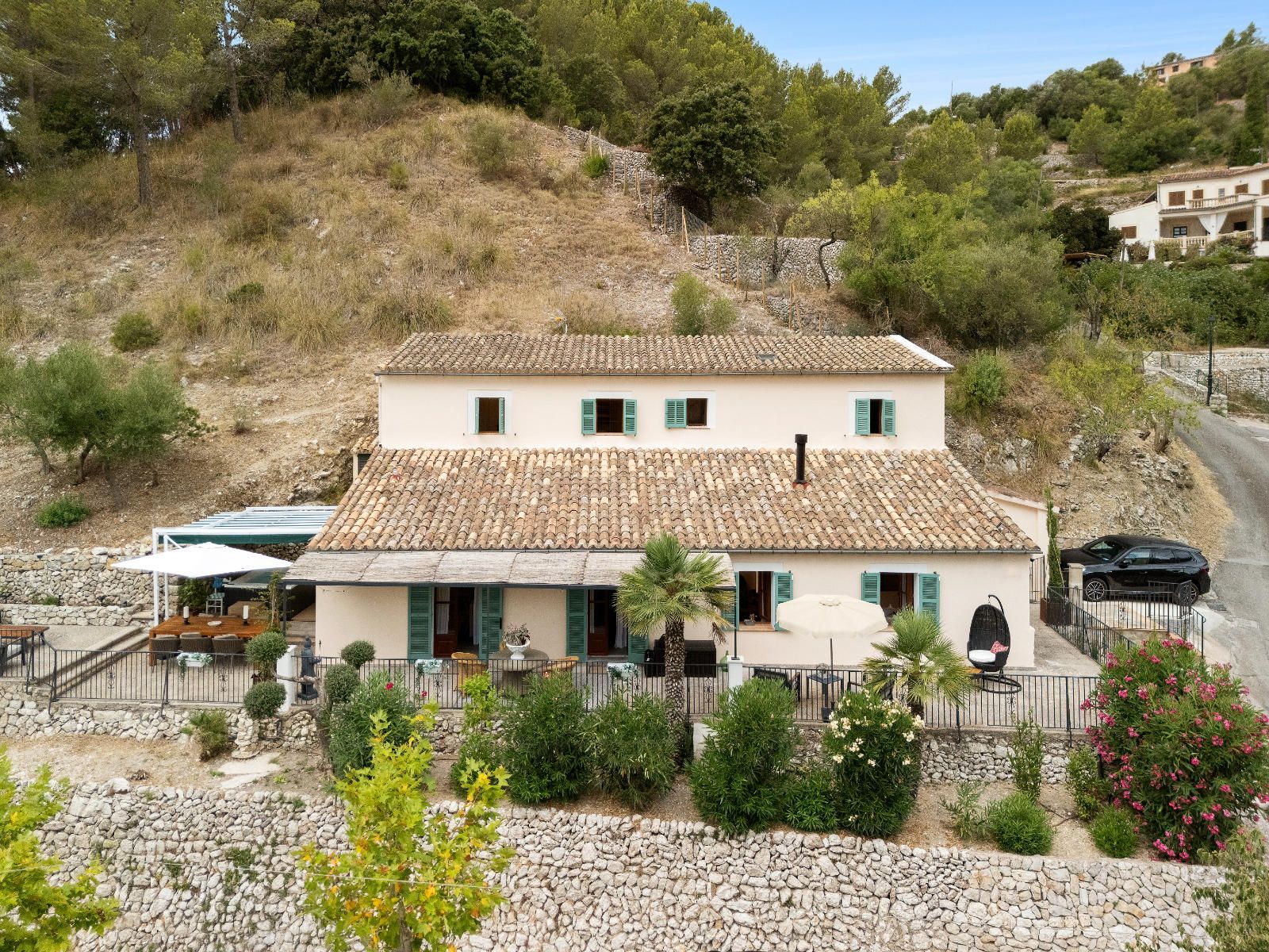 Vista exterior de Casa o xalet en venda en Puigpunyent amb Calefacció, Jardí privat i Terrassa