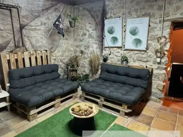 Sala de estar de Casa adosada en venta en El Pinell de Brai con Aire acondicionado, Trastero y Amueblado