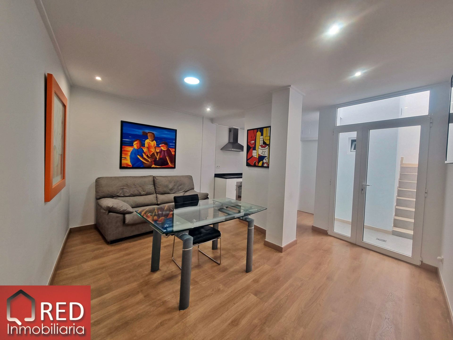 Sala d'estar de Casa adosada en venda en Picassent amb Aire condicionat, Terrassa i Forn