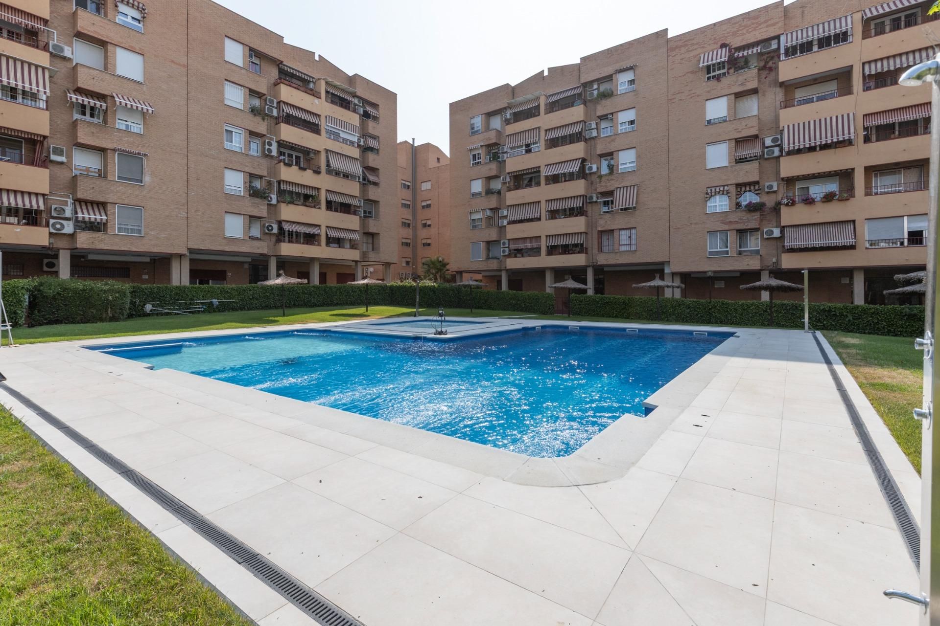 Swimming pool of Attic for sale in  Granada Capital  with Heating, Private garden and Terrace