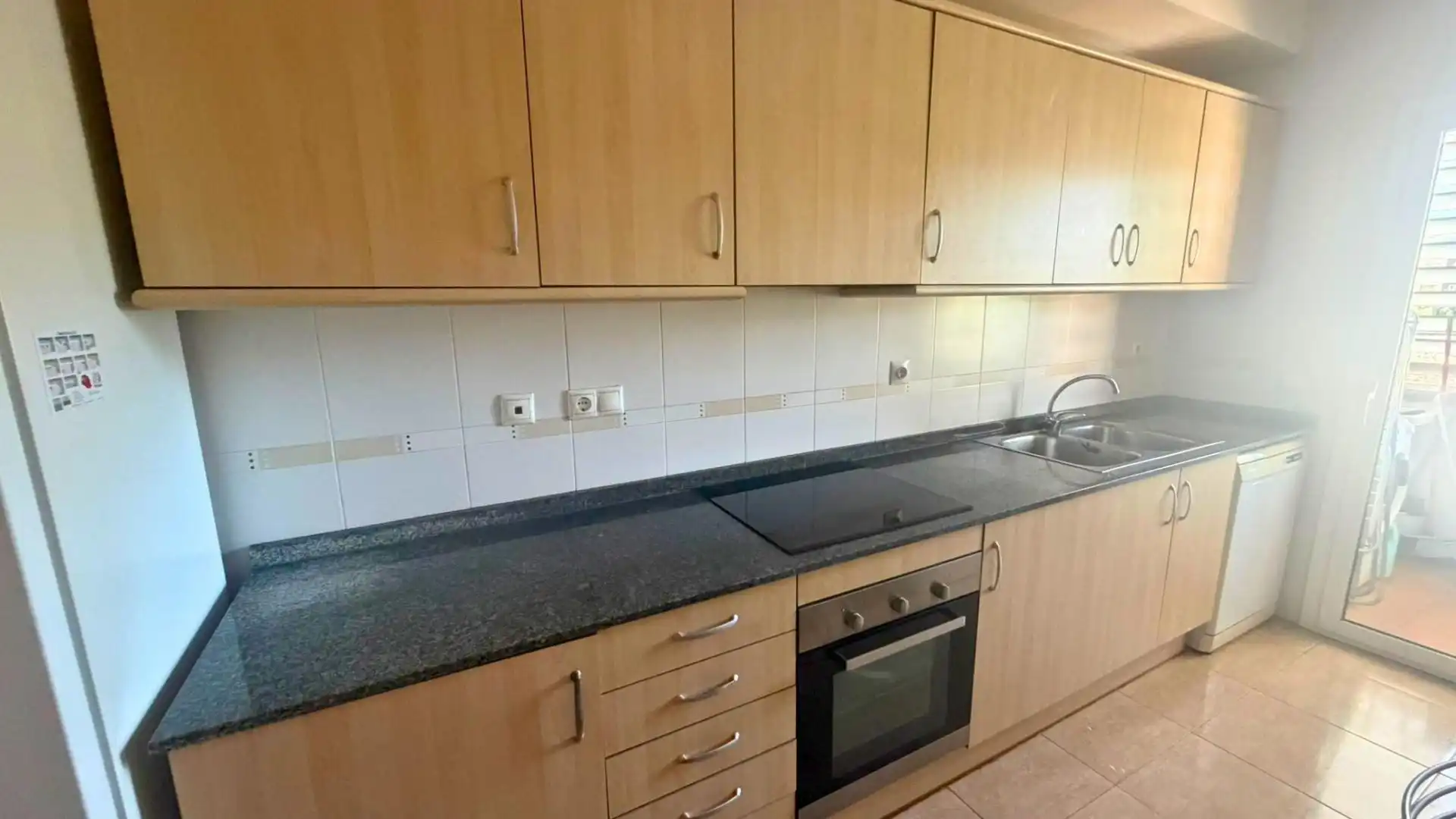Küche von Wohnung zum Verkauf in Sant Celoni mit Heizung und Ofen