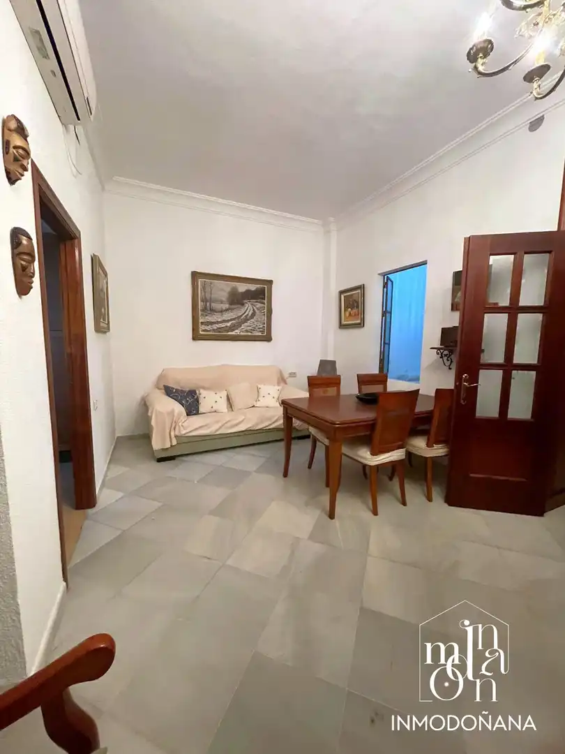 Sala d'estar de Casa o xalet en venda en Bollullos Par del Condado amb Aire condicionat, Terrassa i Moblat