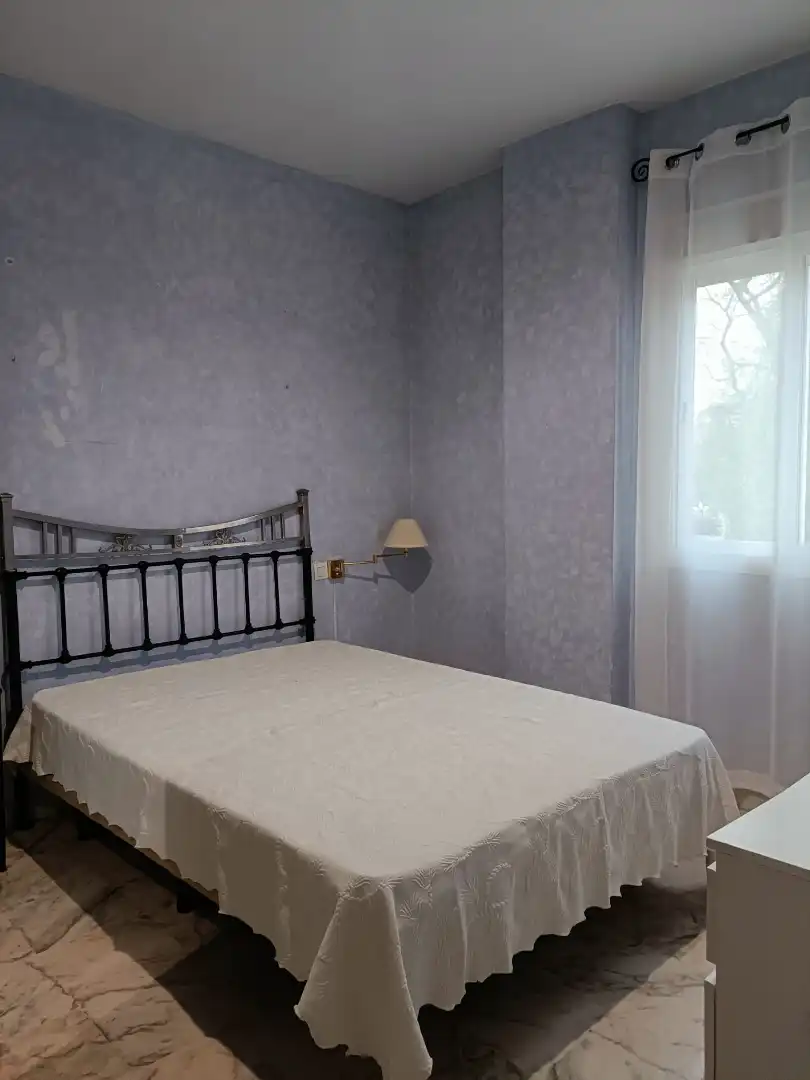 Habitación de Apartamento de alquiler en Sevilla con Aire acondicionado, Calefacción y Jardín privado