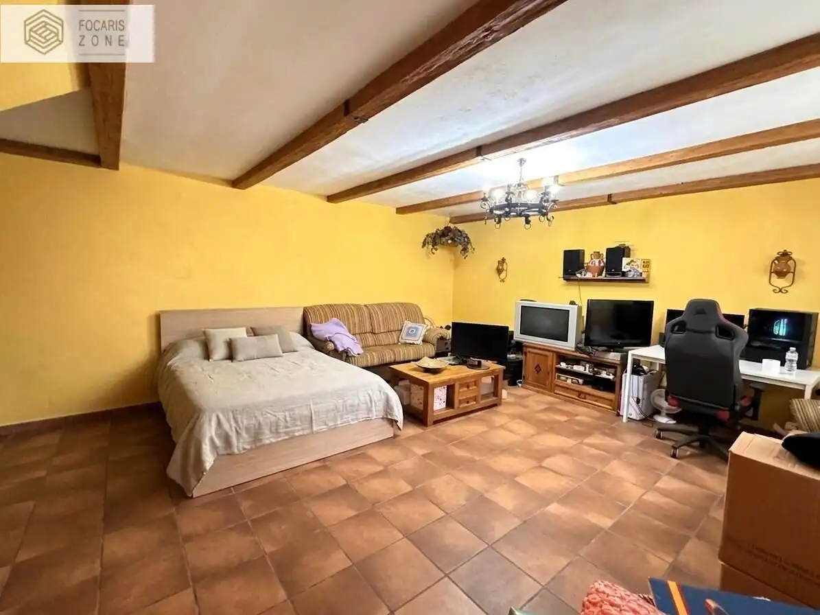 Sala d'estar de Casa adosada en venda en Málaga amb Aire condicionat, Calefacció i Terrassa