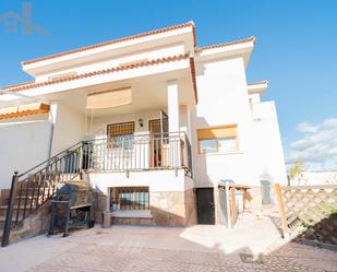 Exterior view of Single-family semi-detached for sale in Sevilla la Nueva  with Terrace