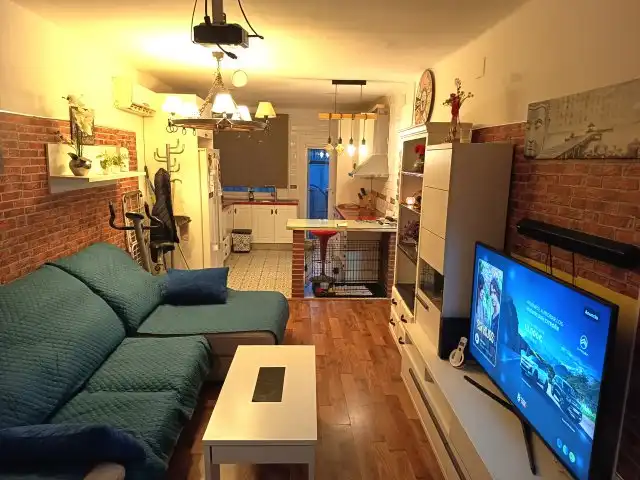 Sala de estar de Casa adosada en venta en Esparreguera con Aire acondicionado, Calefacción y Parquet