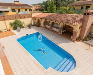 Swimming pool of House or chalet for sale in Girona Capital  with Air Conditioner and Swimming Pool