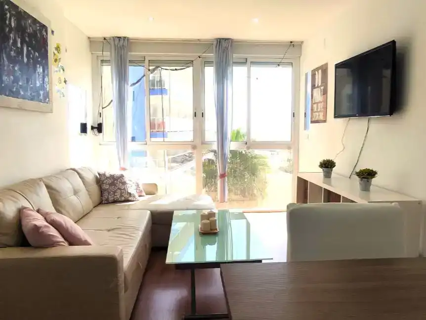 Sala d'estar de Pis de lloguer en Torremolinos amb Aire condicionat