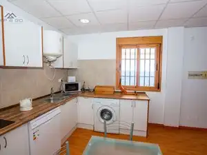 Cuina de Casa o xalet de lloguer en Almuñécar amb Aire condicionat, Jardí privat i Terrassa