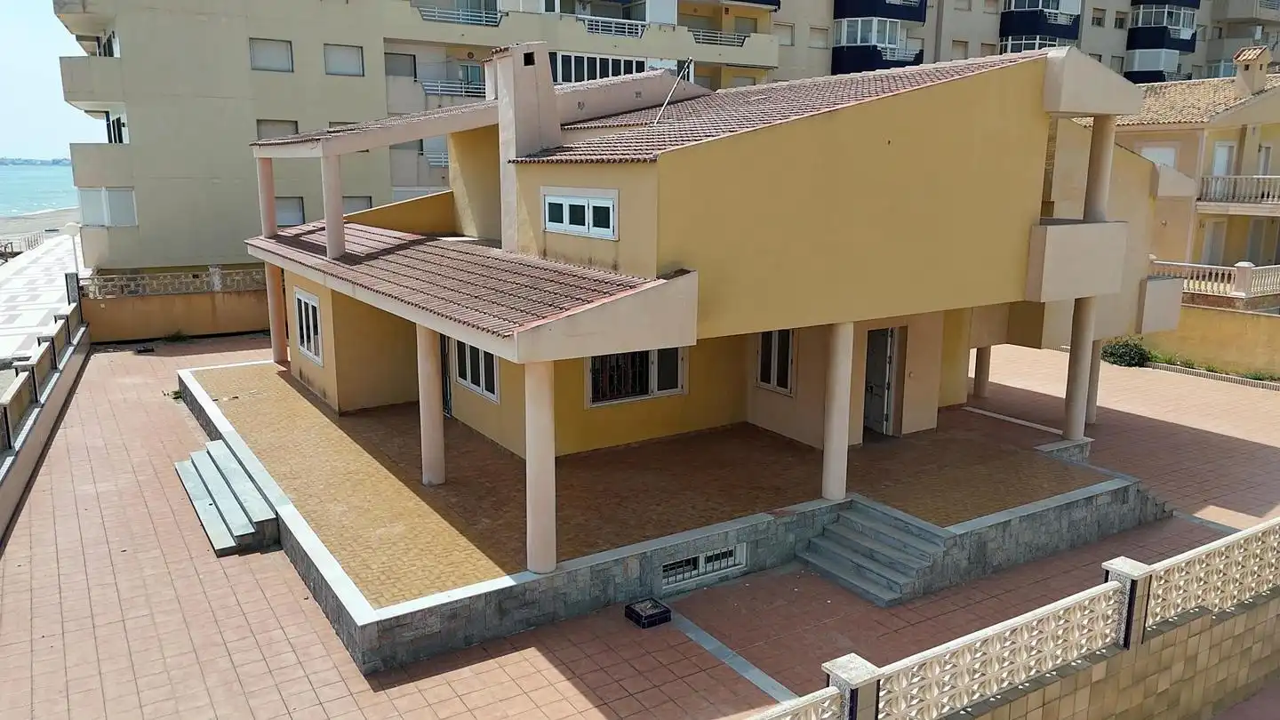 Exterior view of Houses for sale in La Manga del Mar Menor  with Private garden, Terrace and Furnished