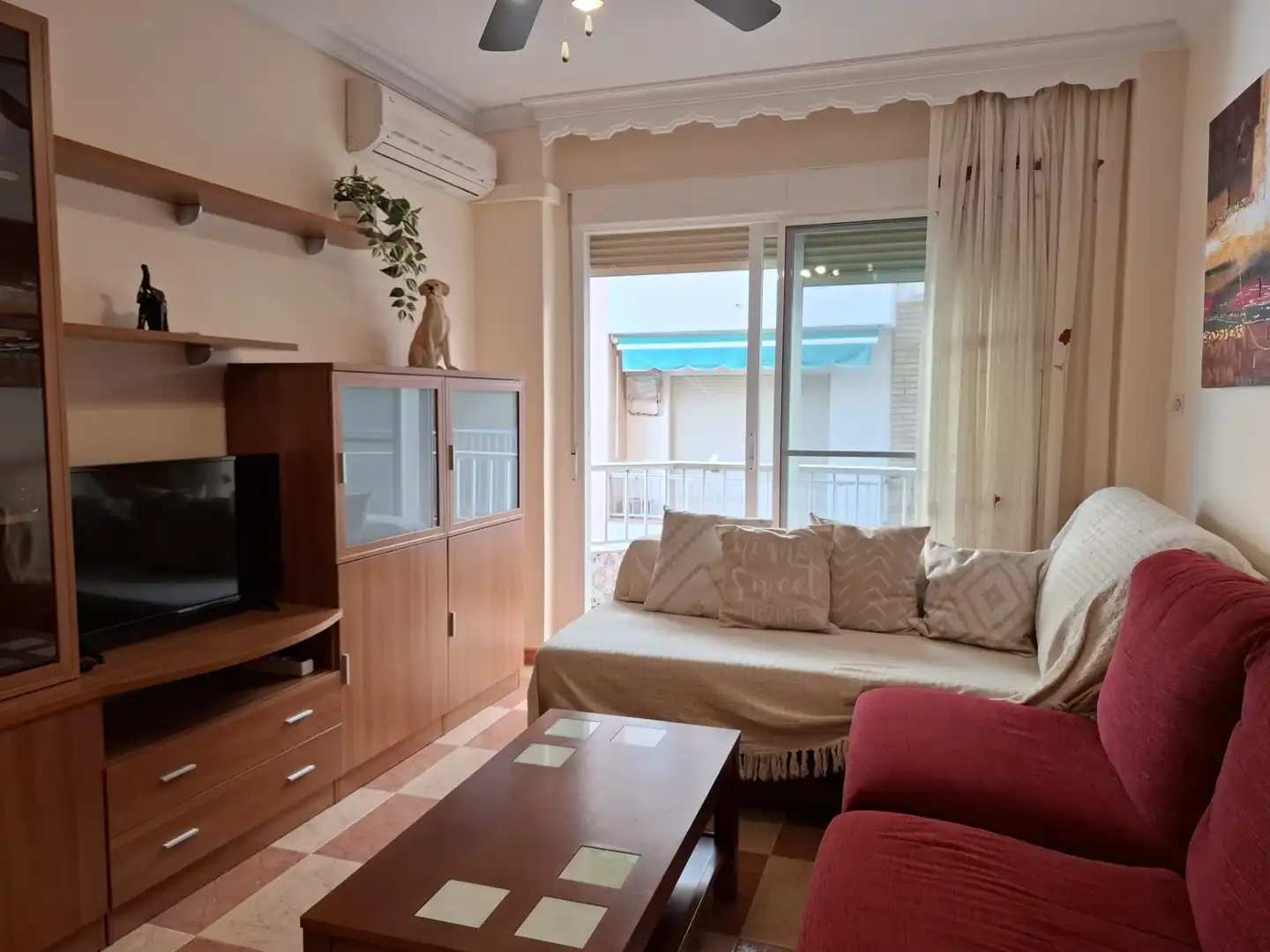Sala de estar de Estudio en venta en Torrenueva Costa con Aire acondicionado, Terraza y Amueblado