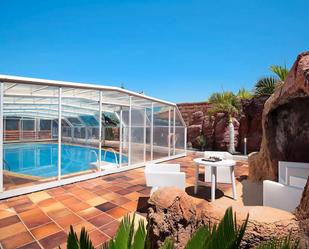 Swimming pool of Single-family semi-detached for sale in Yaiza  with Air Conditioner, Private garden and Terrace