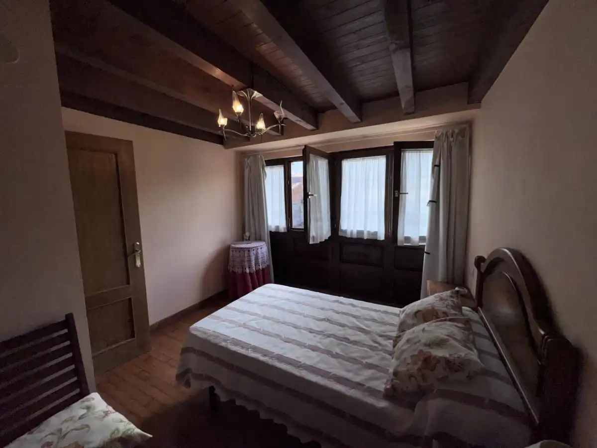 Habitación de Casa adosada en venta en Llanes con Calefacción, Jardín privado y Terraza