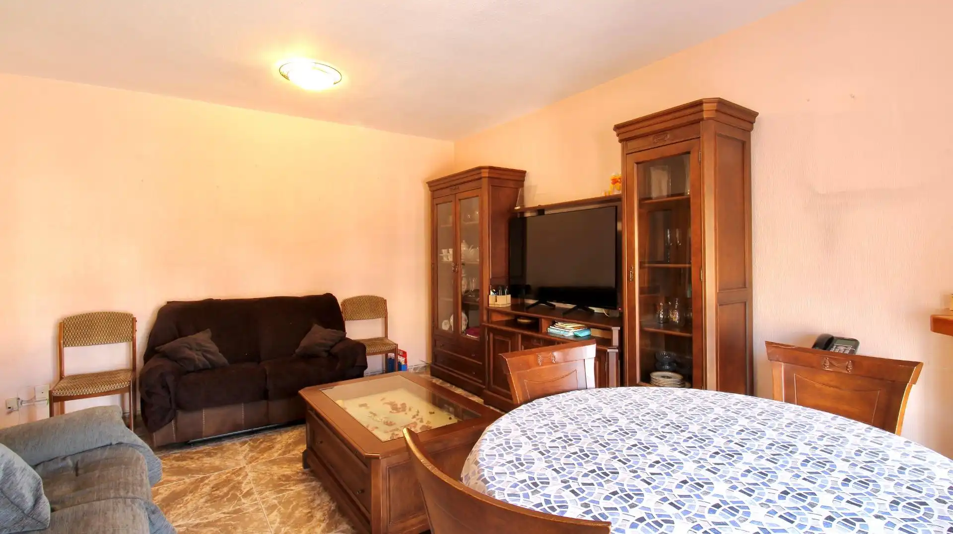 Sala de estar de Casa adosada en venta en Roquetas de Mar con Aire acondicionado, Terraza y Trastero