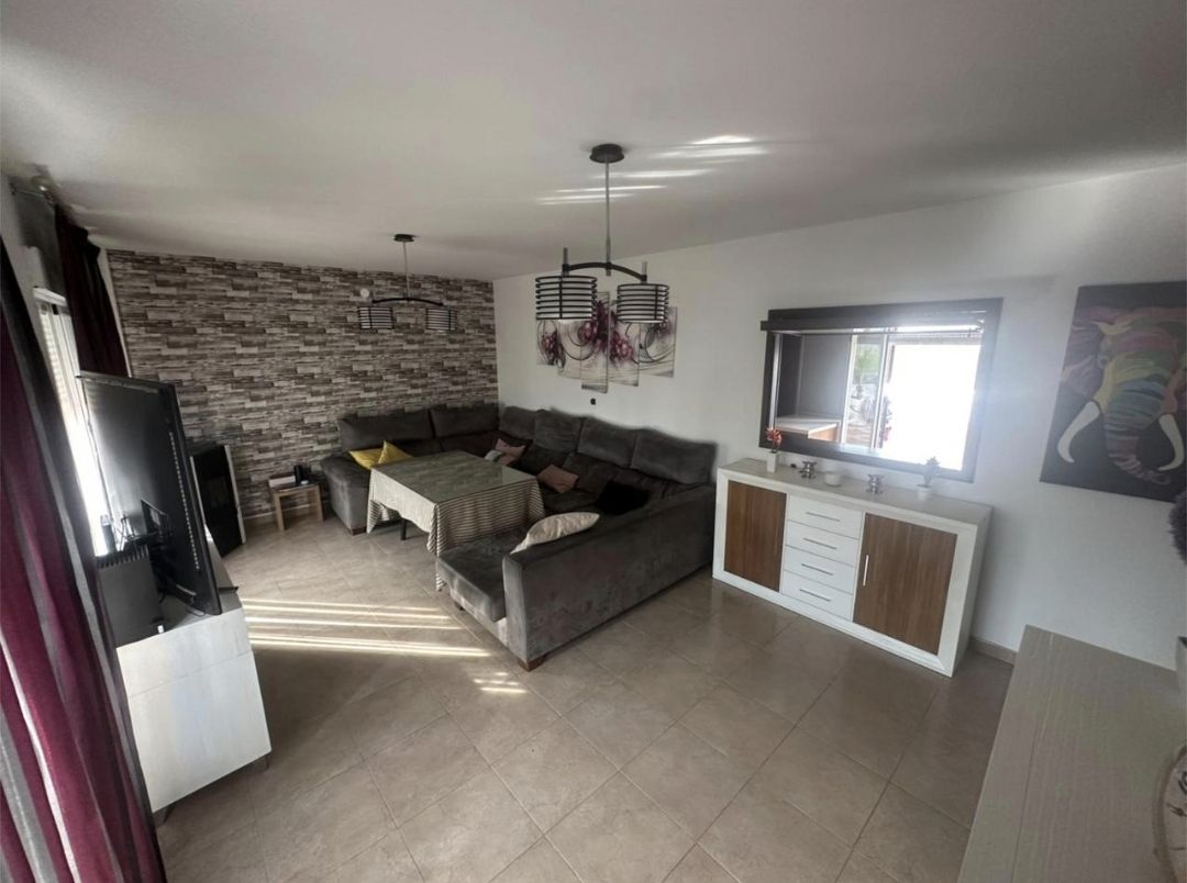 Living room of Single-family semi-detached for sale in Cúllar Vega  with Air Conditioner, Heating and Terrace
