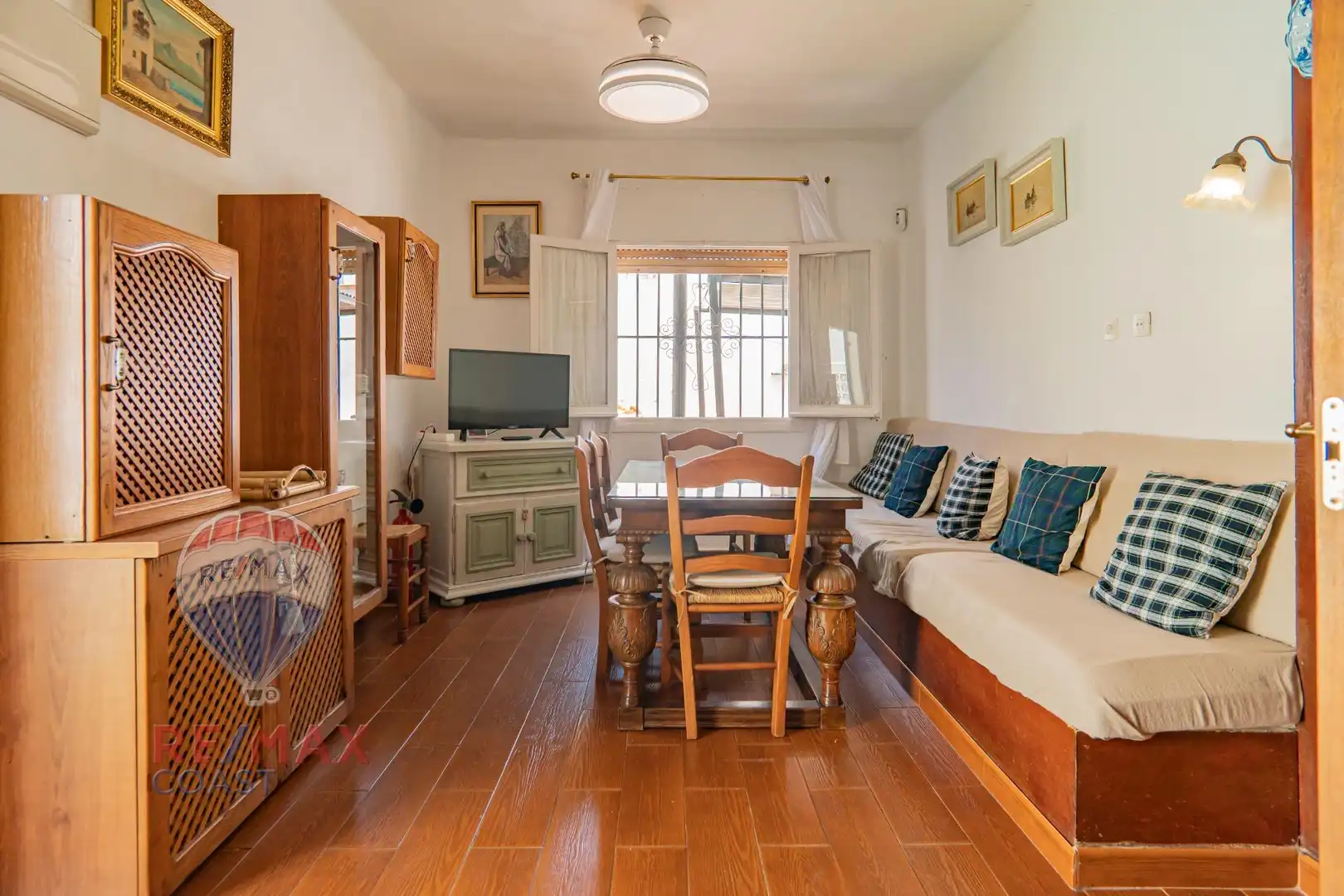 Sala de estar de Casa adosada en venta en Málaga con Aire acondicionado, Jardín privado y Terraza