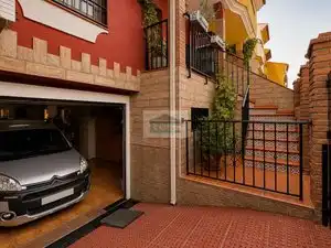Parking de Casa adosada en venta en Vegas del Genil con Aire acondicionado, Calefacción y Jardín privado