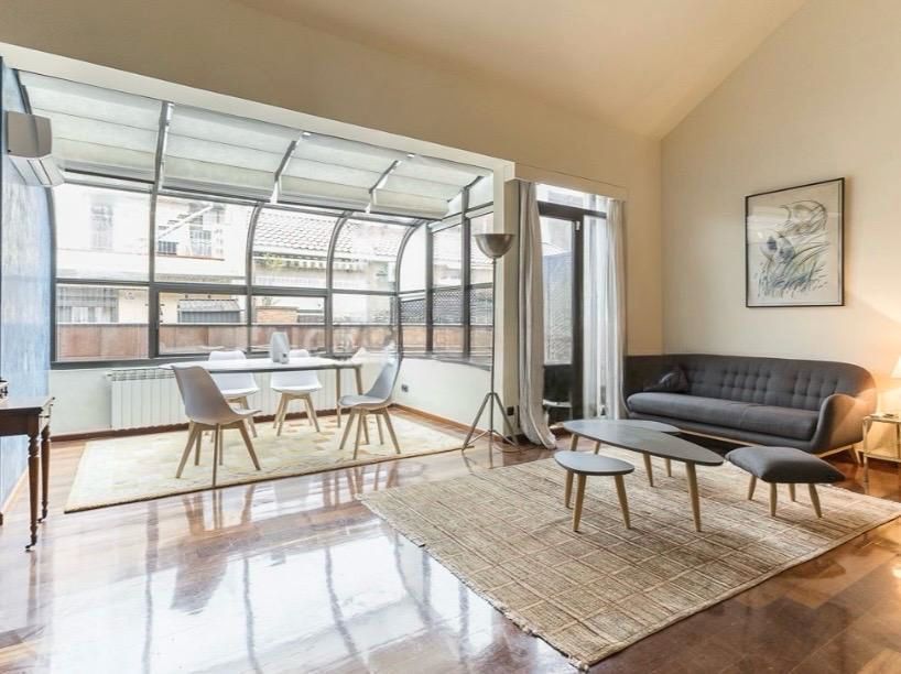 Sala de estar de Ático de alquiler en  Barcelona Capital con Aire acondicionado, Calefacción y Parquet