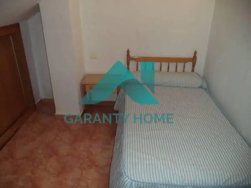 Dormitori de Apartament de lloguer en Cáceres amb Aire condicionat i Moblat